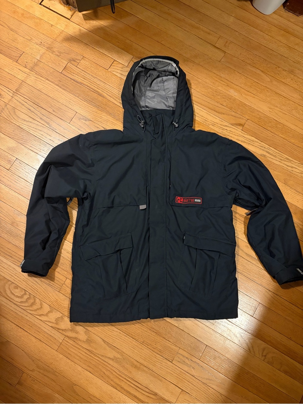 Burton Ronin black colored Sportswear ski jacket with hood size large